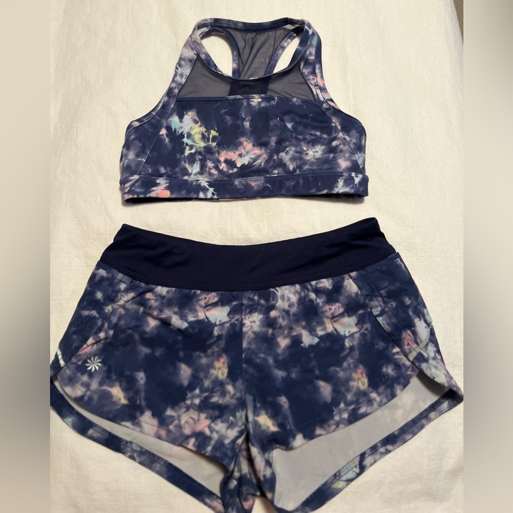 Athleta girl sports bra and breaker shorts 🛝 
Size Medium